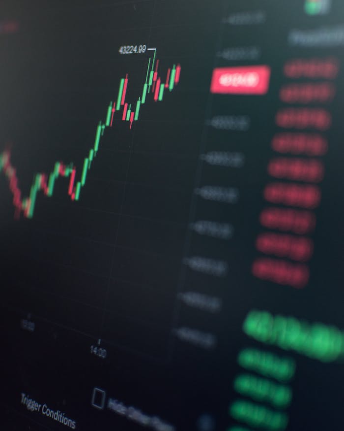 Close-up of a fluctuating cryptocurrency market chart showing stock prices on a digital screen.